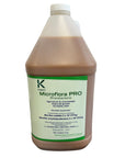 A bottle of Microflora Pro, a liquid microbial supplement for plants, with branding and information printed on the label.