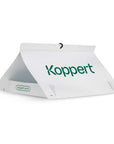 A white, triangular pest control trap with the brand name 'Koppert' printed on it, featuring a suspension hook and a sticky insert.