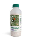 A product image of Spidex Vital containing predatory mites Phytoseiulus persimilis, in a white bottle with a green cap.