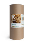 Un emballage cylindrique en carton étiqueté "Nutari" par Koppert, contenant un produit alimentaire complémentaire pour les acariens prédateurs.