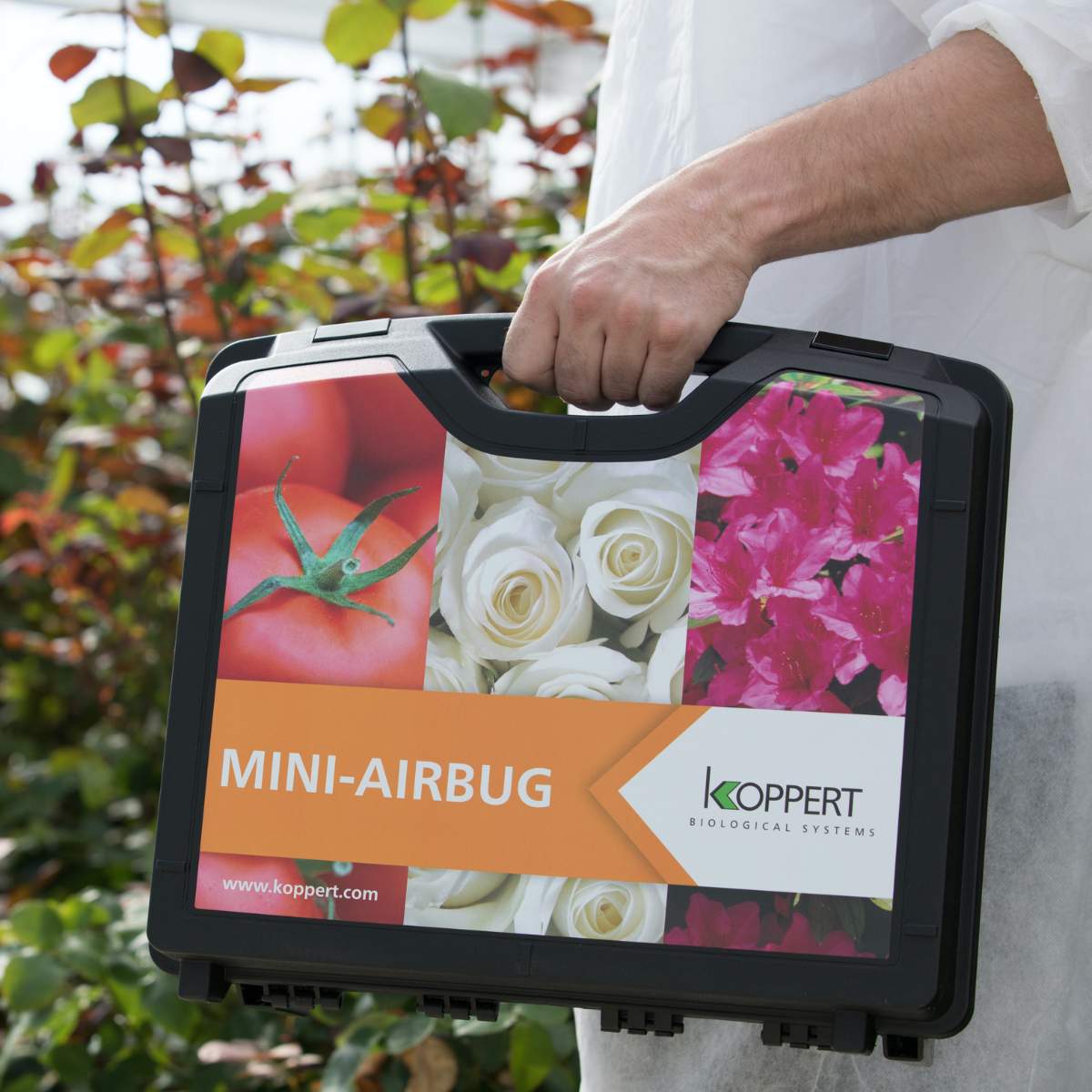Man holding mini-airbug case, 