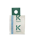 Un sachet d'acariens prédateurs Amblyseius swirskii avec la marque Koppert visible sur l'emballage.